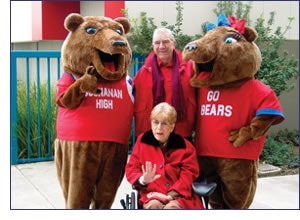 Photo of Dr. Floyd B. Buchanan, his wife, and Doc and Molly, male and female mascots at Buchanan High School