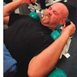 Photo of Jason Buckley pumping iron at 24-Hour Fitness
