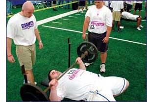 Photo of a student bench-press testing