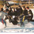 Girls playing football in the snow