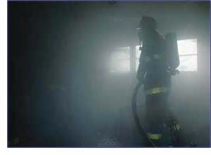 A firefighter in smoke