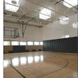 Gym lit by skylights