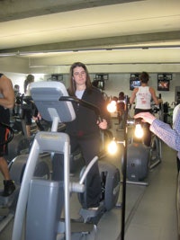 Photo of an OSU student producing electrical power while exercising on an elliptical machine