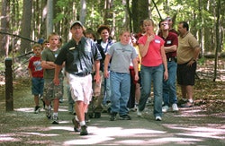 Photo of a park employee leading a group
