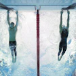 Photo of Michael Phelps (left) securing his seventh gold medal in Beijing by being the first to stop his lane's timing mechanism