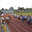 Photo of Coach Bolt speaking to Wichita community residents