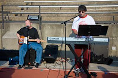 Photo of a band playing during a Shocker Fitness group event