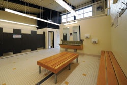 INDOOR/OUTDOOR Through strategic access control and materials selection, the Moody Park Pool locker room in New Westminster, B.C., accommodates pool users throughout the summer, then converts to support athletics programs in an adjacent field house.