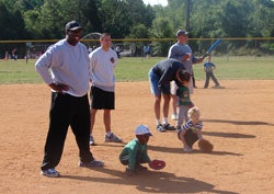 WELL GROUNDEDParents in Huntersville, N.C., help teach their kids how to enjoy sports at an early age in the city's youth programs.