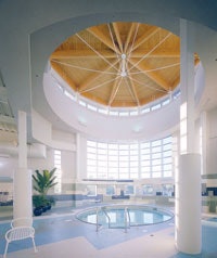 SPA TREATMENT Natural lighting and soft colors in the pool area of the Advocate Good Shepherd Hospital Health & Fitness Center in Barrington, Ill., create a holistic environment.