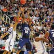 MONEY BALL Critics say the NCAA banks 90 percent of its revenue predominantly on the backs of black males during the Division I men's basketball tournament.