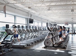 Photo of people working out in a recreation center