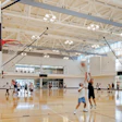 ABOVE BOARDS Basketball goals that drop into position from the ceiling dominate today's gymnasium market.