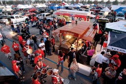 Photo of Houston Texans fans tailgating in a parking lot