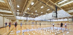 Photo of a group workout session held on a basketball court