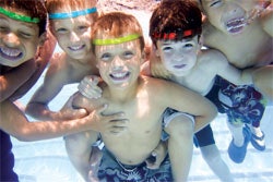 SUBMERGED SMILES The Wahooo Swim Monitor System is designed to keep kids safe in all kinds of recreational water.