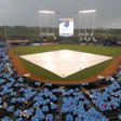 ROYAL TREATMENT Keeping rain off infields, like the one at Kansas City's Kauffman Stadium, is just one of the tasks ably handled by field covers.