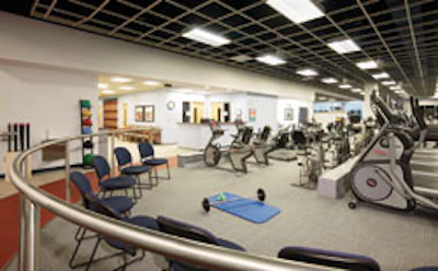 Adjacencies at the Center for Healthy Living in Longview, Texas, provide access to the jogging track and fitness areas for both members and clinical patients. (Photo by Edward LaCasse, courtesy of Ohlson Lavoie Collaborative)