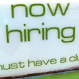 Photo of a now hiring sign