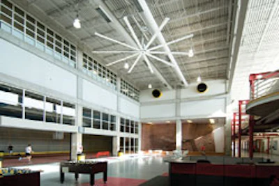 One of dozens of Big Ass Fans installed within Iowa State University's Lied Recreation Athletic Center, this unit pushes warm air down to the floor and into surrounding activity spaces. (Photo courtesy of Big Ass Fans)