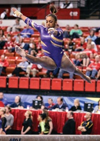 Ashleigh Clare-Kearney was tall and heavy for a gymnast, yet she won several high school titles and two national championships at Louisiana State University. (AP Photo/Nati Harnik)