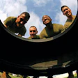 Marines team up to flip some truck rubber during High-Intensity Tactical Training. (Photo by Gunnery Sgt. Alexis R. Mulero, courtesy of United States Marine Corps)
