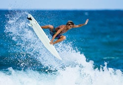In the 50th state, at least, interest in interscholastic surfing is on the rise. (Image Â© Bobby Schutz/Istockphoto.com)