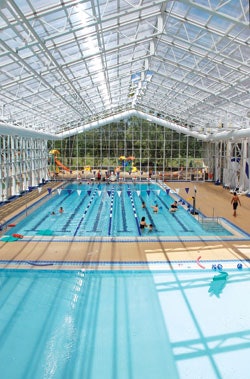 A pool enclosure with operable panels allows Royal Glenora Club to take advantage of Alberta's pleasant summer months. (Photo courtesy of OpenAire)