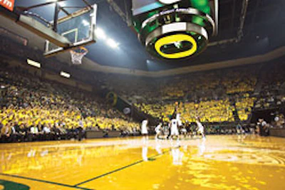 Painted designs and high-gloss finish on the University of Oregon's new competition court prompted viewer complaints, but flatter finish formulations are in the works. (Photo by Eric Maxwell/AECOM)
