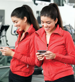 The ability to touch members via their mobile devices has become a popular facility software function. (Image &copy; Punchstock)
