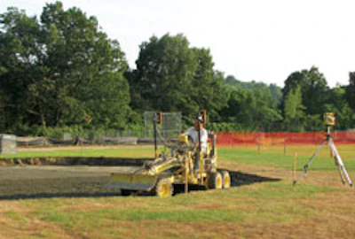 The road to perfect planarity and pitch begins with the laser-grading of sub-base material. (Photos courtesy of Cape and Island Tennis & Track)
