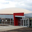 Multicolored brick and a bright entry prevent the Archie (Mo.) R-V School District's new monolithic dome gymnasium from looking like it
