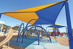 SUNSCREENS Carefully placed shade structures protect children during the hottest part of the day. (Photo Courtesy of Shade 'N Net)