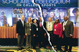 LAME DUCK SESSIONS The fate of the Scholarly Colloquium on Intercollegiate Athletics already sealed, Ellen Staurowsky (third from left) and Dave Wiggins (third from right) guided the 2013 programming in Dallas.