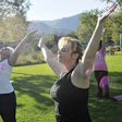 PARKING SPACES The increased use of green spaces by outdoor yoga and boot camps has left little room for casual users in some communities.(© Marla Brose/Albuquerque Journal/ZUMAPRESS.com)