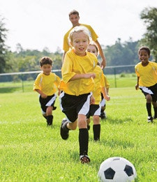 SETTING GOALS Proponents of no-score policies argue that more emphasis needs to be placed on fundamental skills. (Photo Kali Nine LLC/ISTOCKPHOTO.COM)