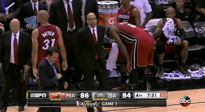 Miami's LeBron James cramped up in the fourth quarter as temperatures on the court soared into the 90s at San Antonio's AT&T Center Thursday night.