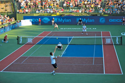 TOSS UP Not until World Team Tennis burst onto the scene in the 1970s did color coatings reach their full potential. (Photo Courtesy of Fred & Susan Mullane/Camerawork USA)