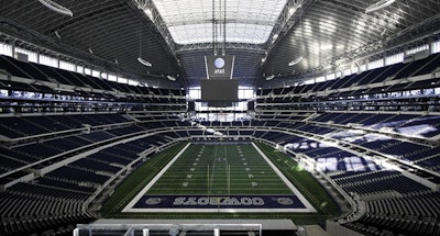 A man was injured when he fell from the first row of AT&T Stadium down to the field-level suites below.
