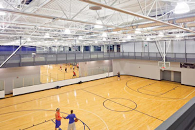 ON BOARDS Some MACs combine dashers and walls as court boundaries, but less common is the MAC with a hardwood surface. (Photos Courtesy of RDG Planning & Design) — Click here to see more