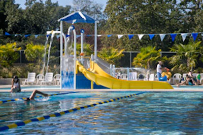 FRESH WATER Renovations to Hamilton Pool in Novato, Calif. replaced a 20- by 50-yard pool with a 25-yard pool and 1,778-square-foot wading pool with a play structure. (Photos by David Wakely) - Click here to see more