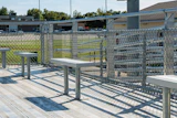 LOCATION, LOCATION Relegated to parking their wheelchairs on a ground-level track last season, wheelchair-using fans of Hampton-Dumont High School football now have their own elevated deck. (Photos courtesy of Kay Park Recreation)