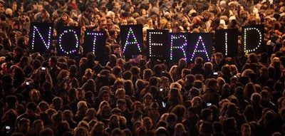 People gather in Paris to show support for the victims of the shooting at Charlie Hebdo. Photo via @JimDalrympleII on Twitter.