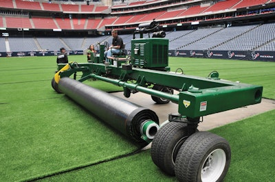 ROLL MODEL Some forms of portable turf produce the fewest steams but require heavy machinery during installation of removal. (Photo Courtesy of AstroTurf)