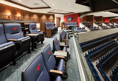 COMFORT ZONES Wider seats and social spaces, like those now featured at Southern Methodist’s Moody Coliseum, are the two biggest consumers of seating capacity in most renovations. (PHOTOS COURTESY OF HOK, © STEVE HINDS, ALL RIGHTS RESERVED)