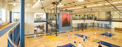 SOUND DESIGN The gymnasium at the Shepherd University Student Wellness Center was designed for change. The acoustic panels, multi-level lighting and flexible sound and power distribution allow it to quickly change to accommodate sporting and recreation programs, as well as social events. (photo By Myro Rosky/Rosky & Associates Inc.)