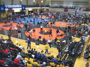 SPORTING SUCCESS The University of Houston's multi-activity court (MAC) becomes the site of the 100-booth Career Day, and a gymnasium normally used for court sports hosts the NCAA Wrestling Championship.