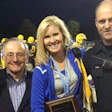 Carmel (Ind.) High School was recognized with the Sports Event Security Aware designation during a football game this past fall. From left to right are Carmel athletics director Jim Inskeep, NCS4 Director Lou Marciani, Carmel assistant principal Amy Skeens-Benton and Carmel Police Sgt. Phil Hobson. (Photo courtesy of Carmel High School.)