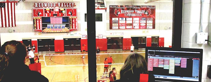 Caption: Redwood Valley High School video production team members get a control-room view of the volleyball court. [Photo courtesy of Daktronics]