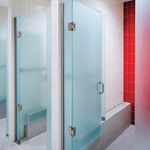 Personal shower and changing stall at the University of Nebraska-Lincoln's East Campus Recreation & Wellness Center [Photo courtesy of HOK]
